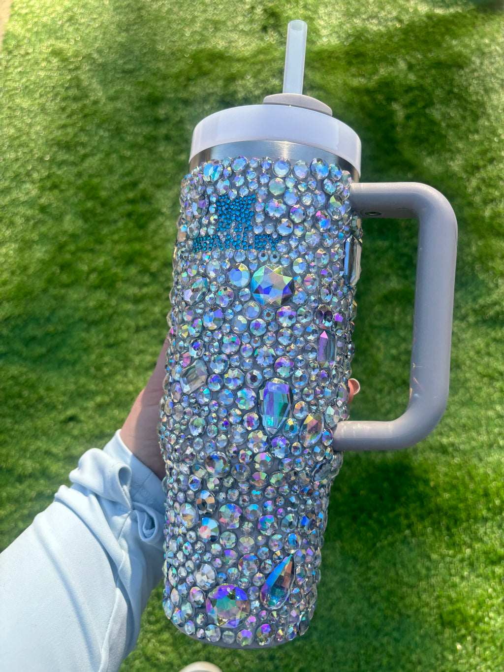 RhinestoneStanley with clear crystals and teal blue logo. 30oz