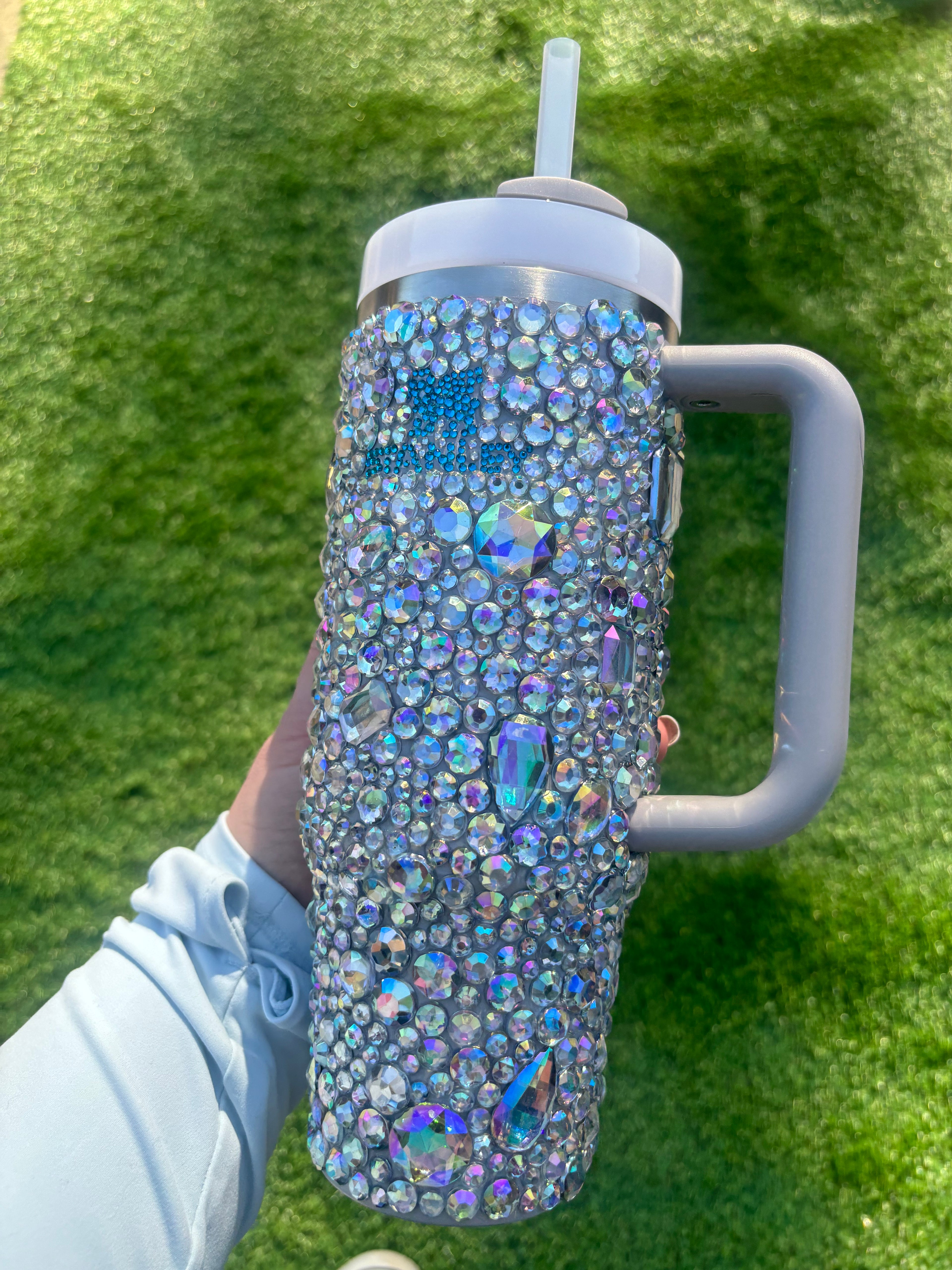 RhinestoneStanley with clear crystals and teal blue logo. 30oz