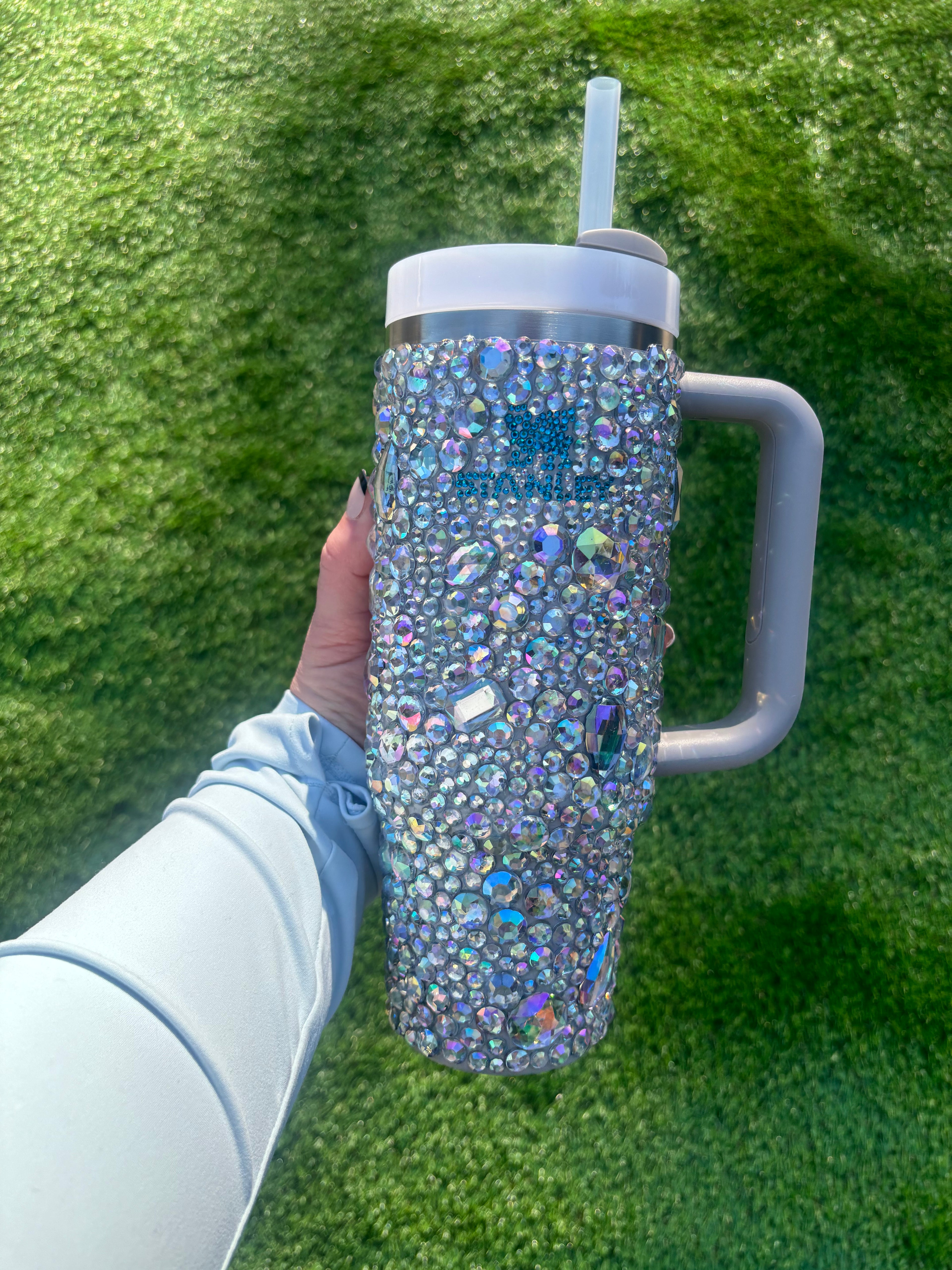 RhinestoneStanley with clear crystals and teal blue logo. 30oz