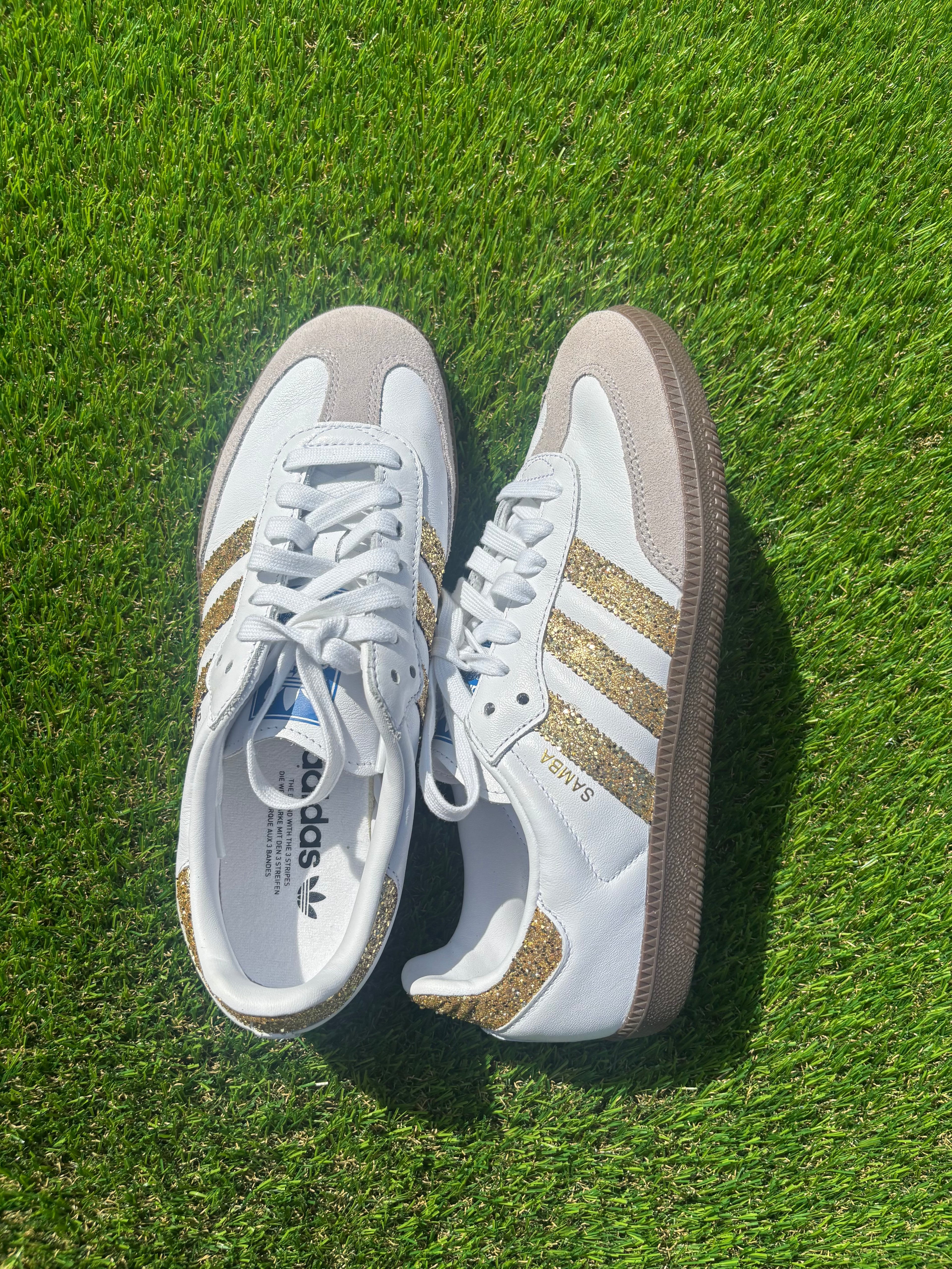 Gold glitter Adidas samba OG sneakers.